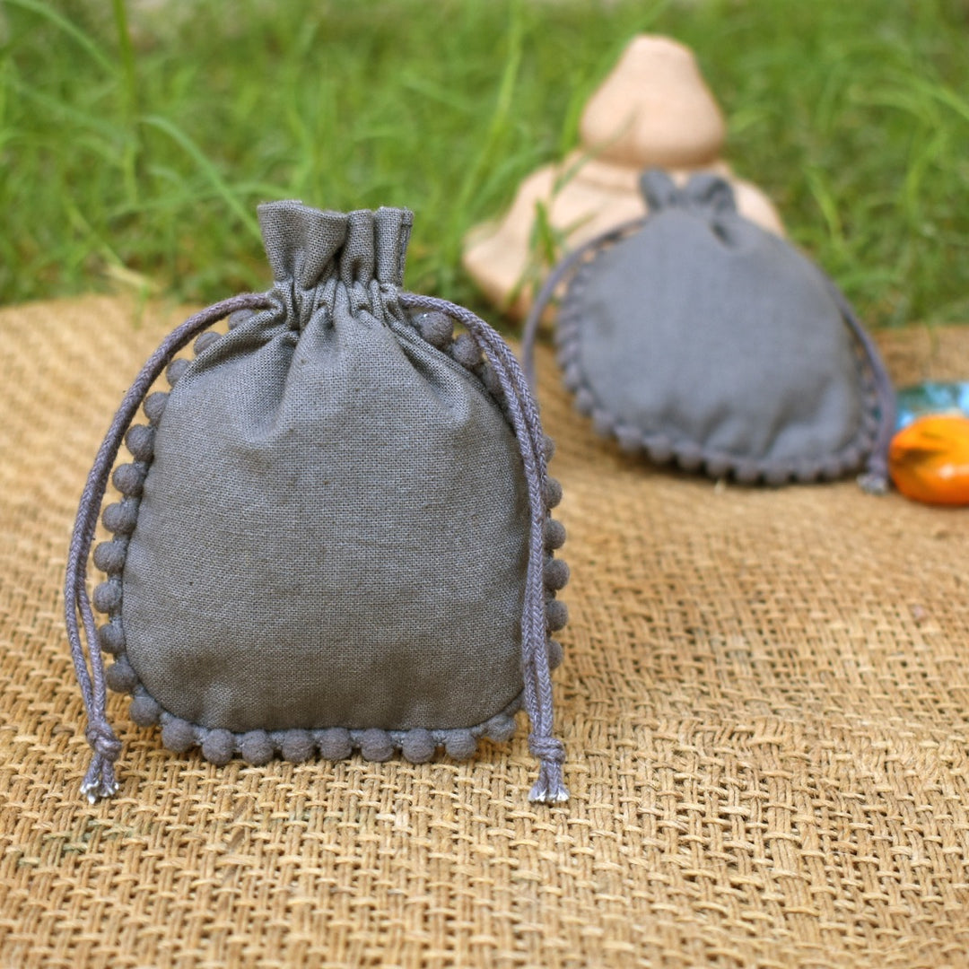 Small Gray Cotton Jewelry Pouches, Handmade Indian Storage Bags, Round PomPom Packaging Bags β CraftJaipur