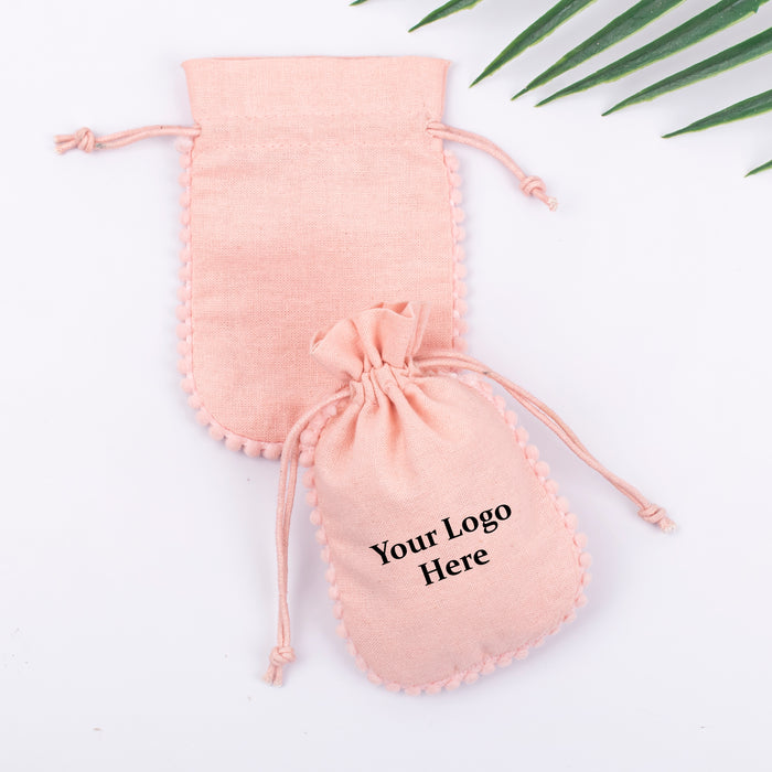 Pack Of 100 Peach Round PomPom Jewelry Packaging Pouch, Designer Wedding Favor Bags - CraftJaipur