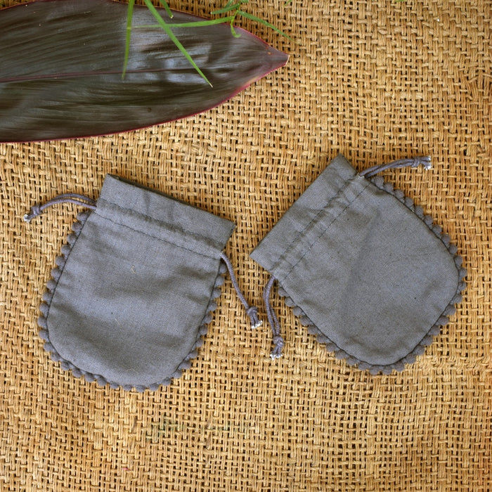 Small Gray Cotton Jewelry Pouches, Handmade Indian Storage Bags, Round PomPom Packaging Bags – CraftJaipur